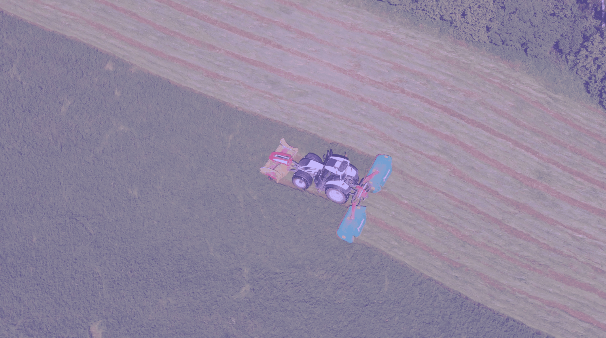 Tractor plowing a field representing Baltic Terra agricultural investment opportunity